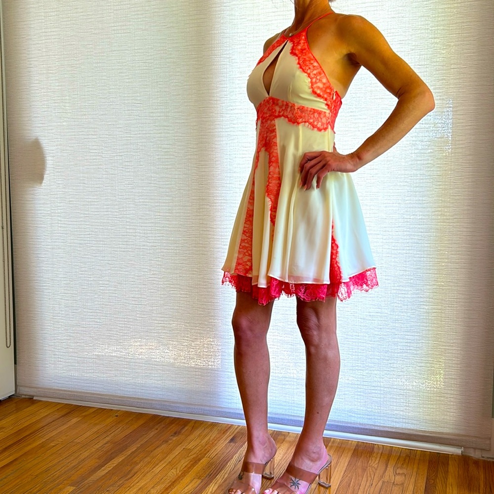 Bebe classic dress cream pink worn only once, excellent condition.